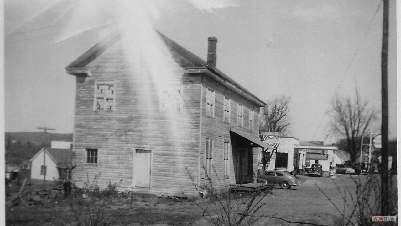 Old Huntsville Masonic Lodge & service stations beside it