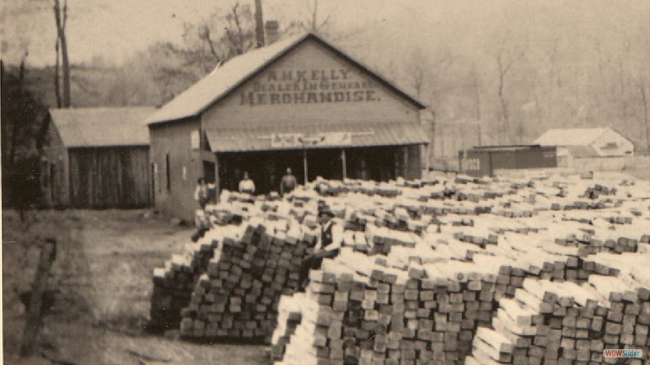 A.M. Kelly Store at Dutton on April 7, 1908; railroad car and railroad ties